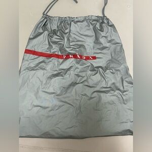 Prada Silver Drawstring Shoe Bag with Red Accent